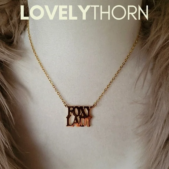 LOVELYTHORN // custom foxy lady 18K gold-plated 16 stainless steel nameplate